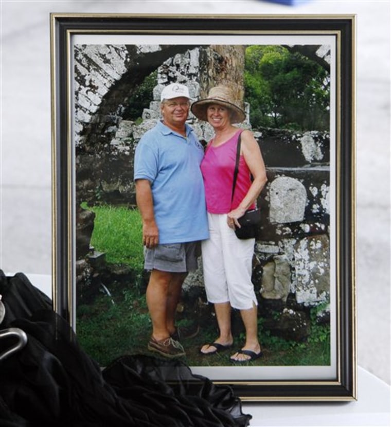 This photo of Scott and Jean Adam is on display at a memorial service March 2 for the couple, shot to death Feb. 22 by Somali pirates while sailing south of Oman. The service was held at the Fuller Theological Seminary in Pasadena, Calif., where Scott Adam was a student, then an adjunct professor, after leaving a 30-year career as a Hollywood associate producer. 
